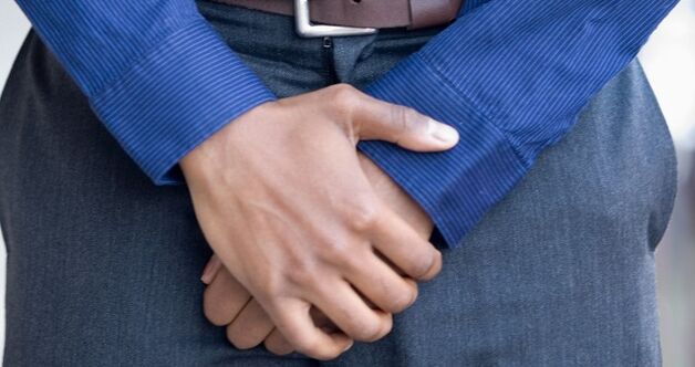 Pain in the groin as a symptom of prostatitis in a human